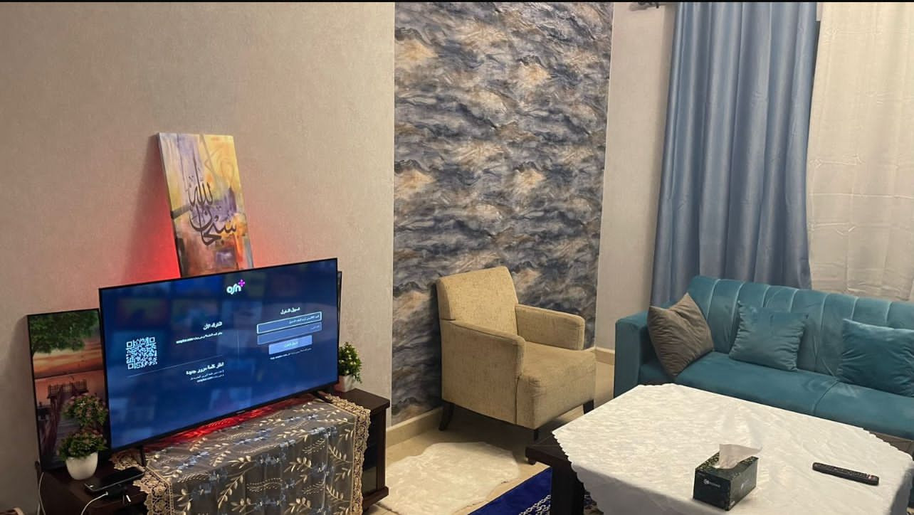 One bedroom and living room furnished with clean furniture and two bathrooms
