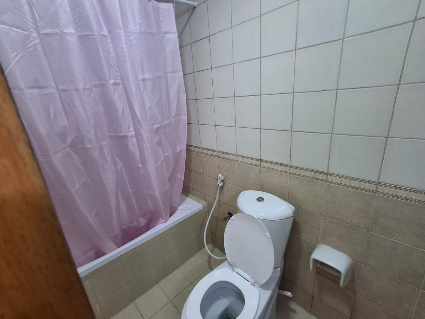 One bedroom and living room furnished with clean furniture and two bathrooms