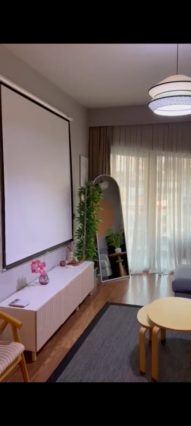 One bedroom and living room within a complex