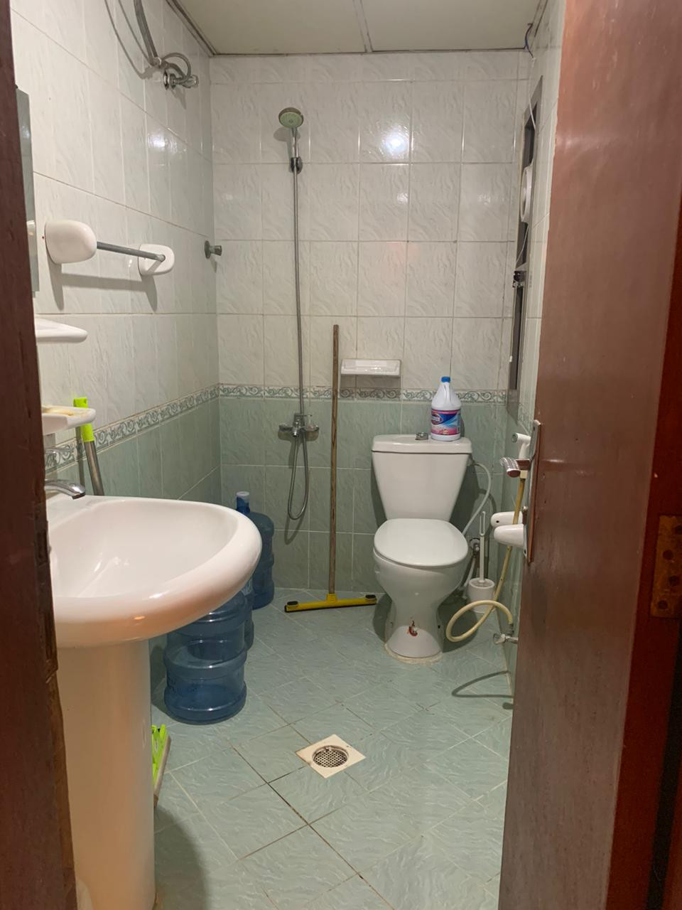 One bedroom and living room furnished with clean furniture