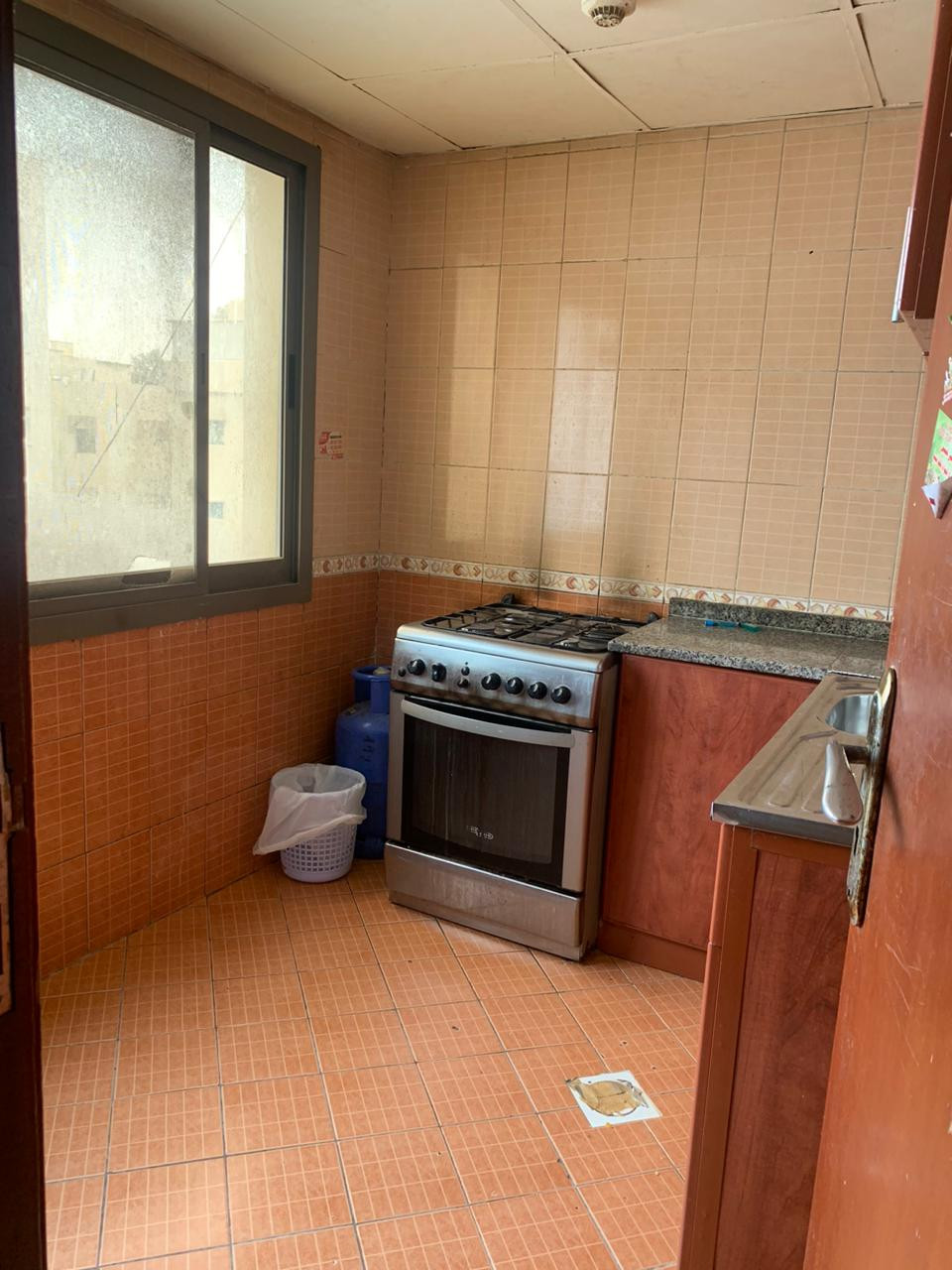 One bedroom and living room furnished with clean furniture