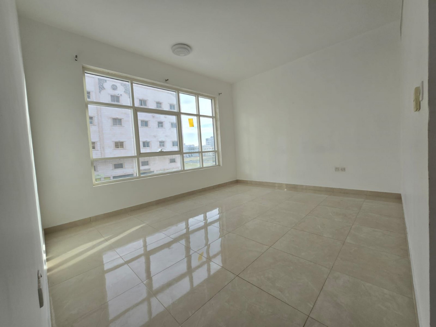 One bedroom and living room for annual rent in Al Jurf 3, Ajman, with excellent space, 2 bathrooms, balcony, open view, easy access to Dubai.