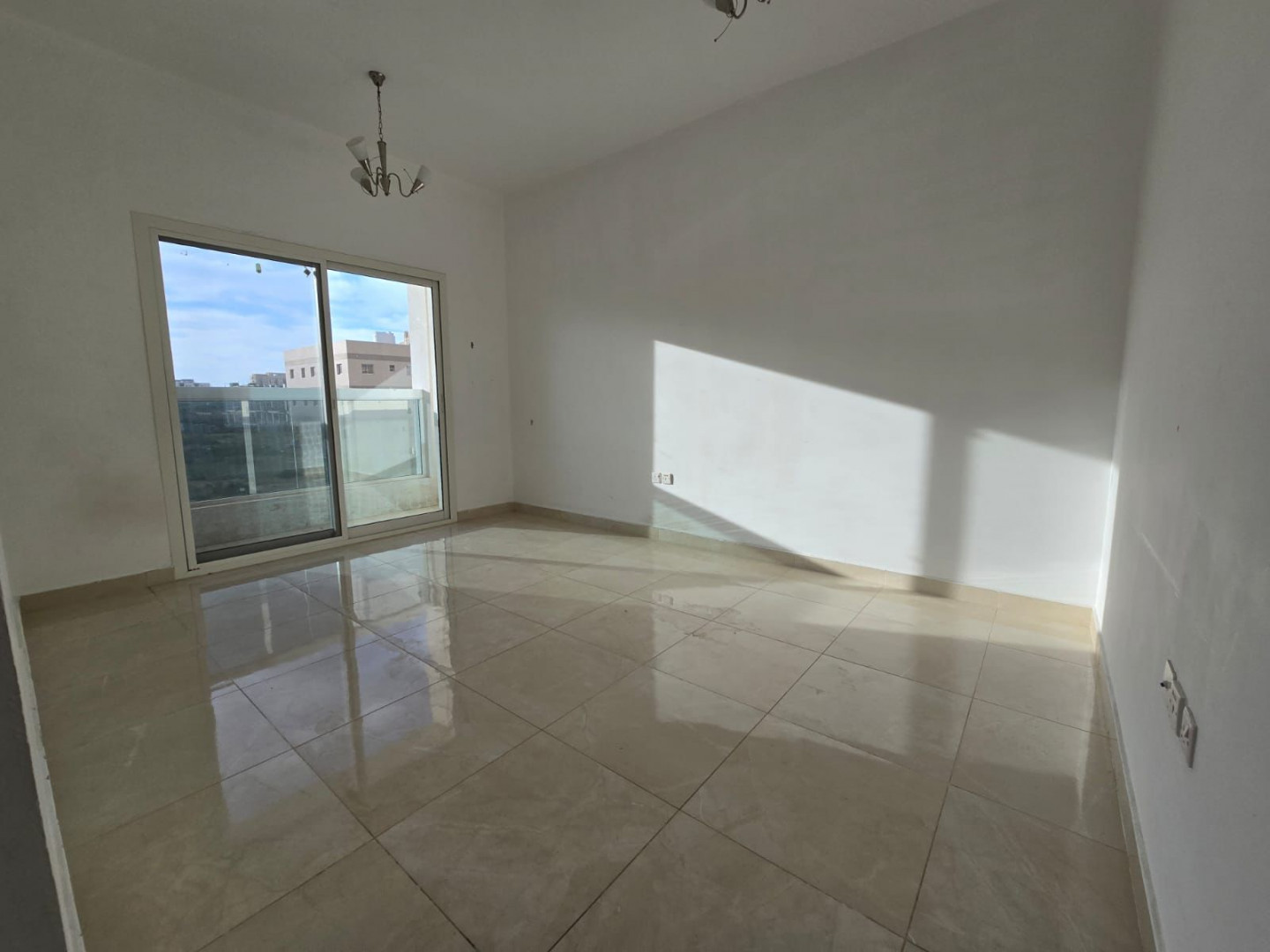 One bedroom and living room for annual rent in Al Jurf 3, Ajman, with excellent space, 2 bathrooms, balcony, open view, easy access to Dubai.