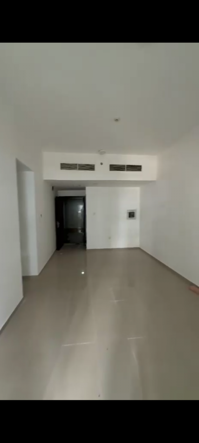 Two bedrooms and a living room in Pearl Towers