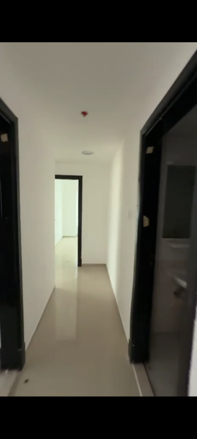 Two bedrooms and a living room in Pearl Towers