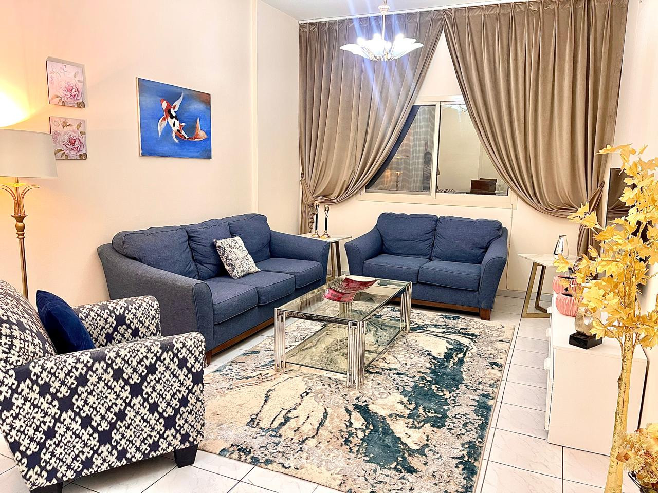 Two bedrooms and a living room with a balcony in Al Qasba