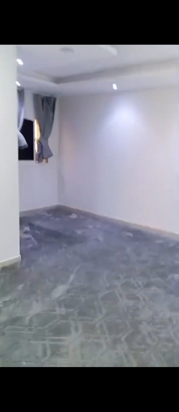 Two bedrooms, a living room, a bathroom, and a separate kitchen.