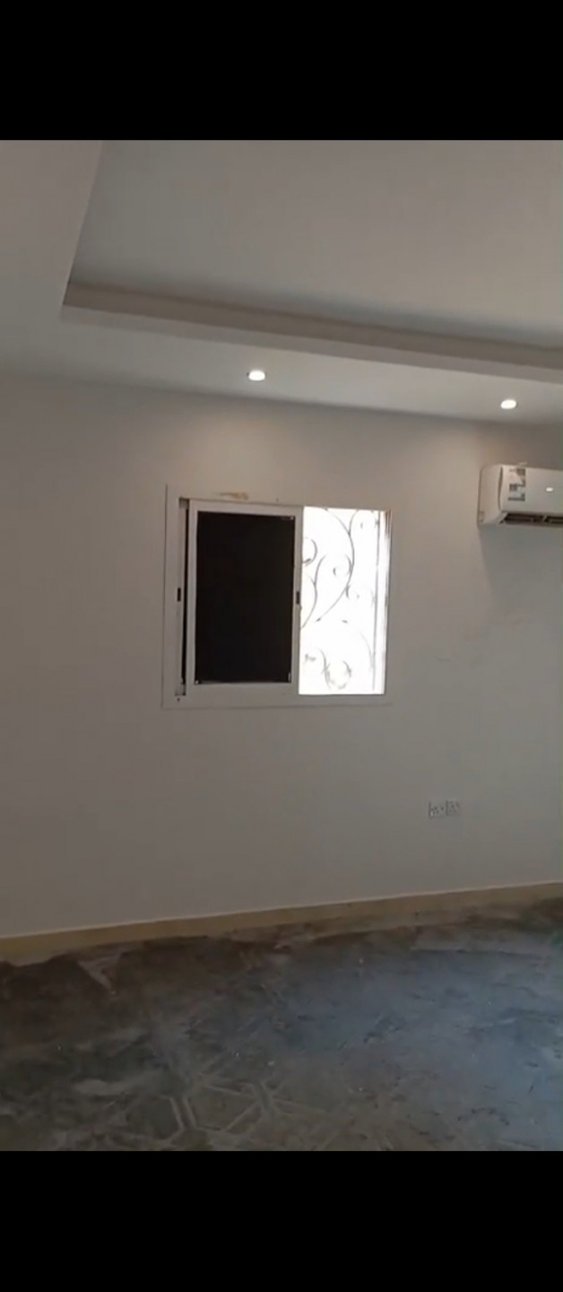 Two bedrooms, a living room, a bathroom, and a separate kitchen.