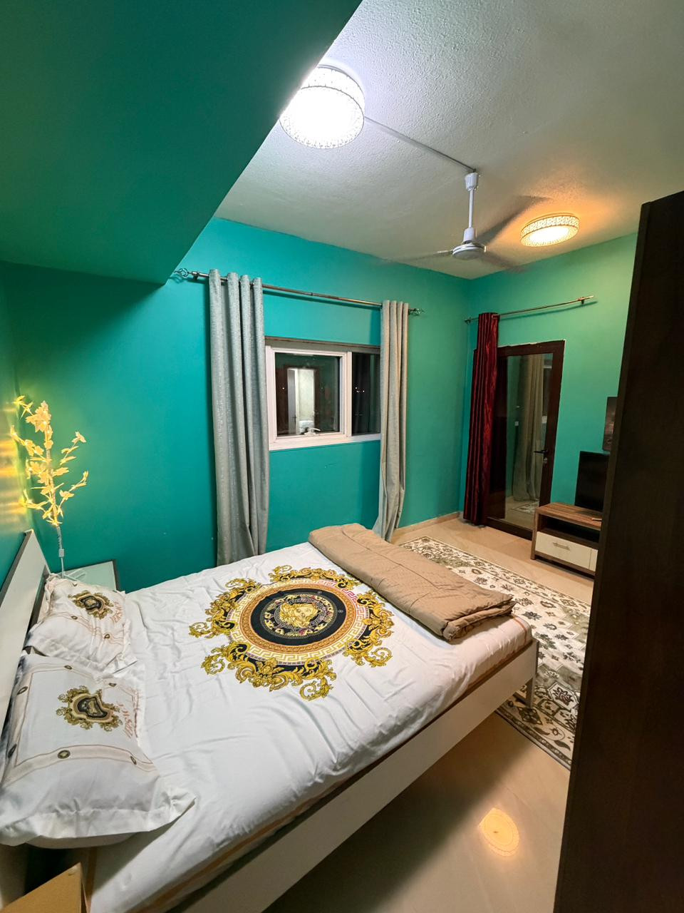 Two bedrooms and a living room on Ajman Corniche