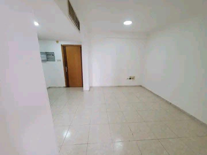 Two bedrooms and a living room, unfurnished