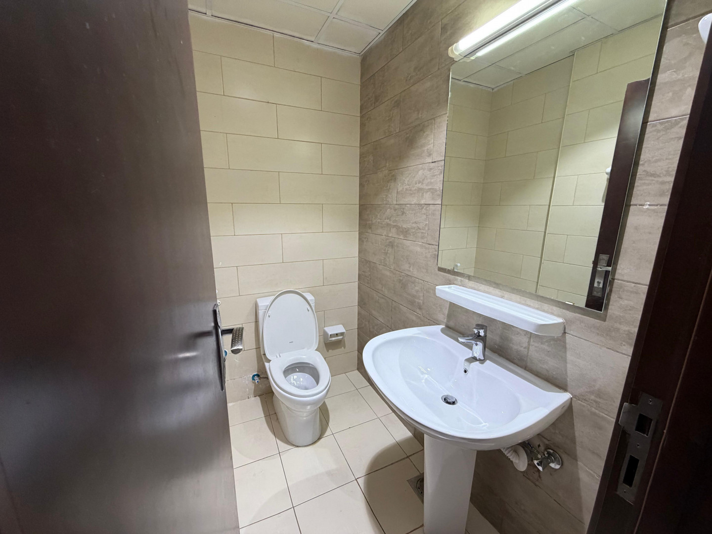 Two bedrooms and a living room, unfurnished