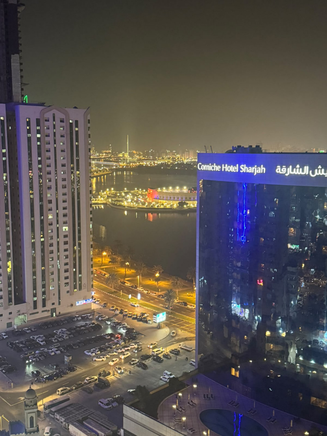 Two bedrooms and a living room, furnished with clean furniture and a balcony.