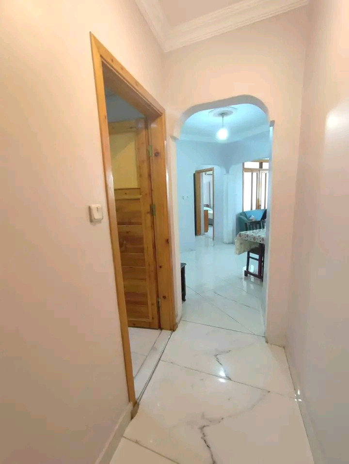 Two fully furnished and air-conditioned bedrooms and a living room
