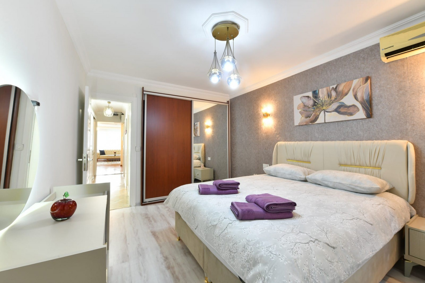 Two rooms and a living room with air conditioning