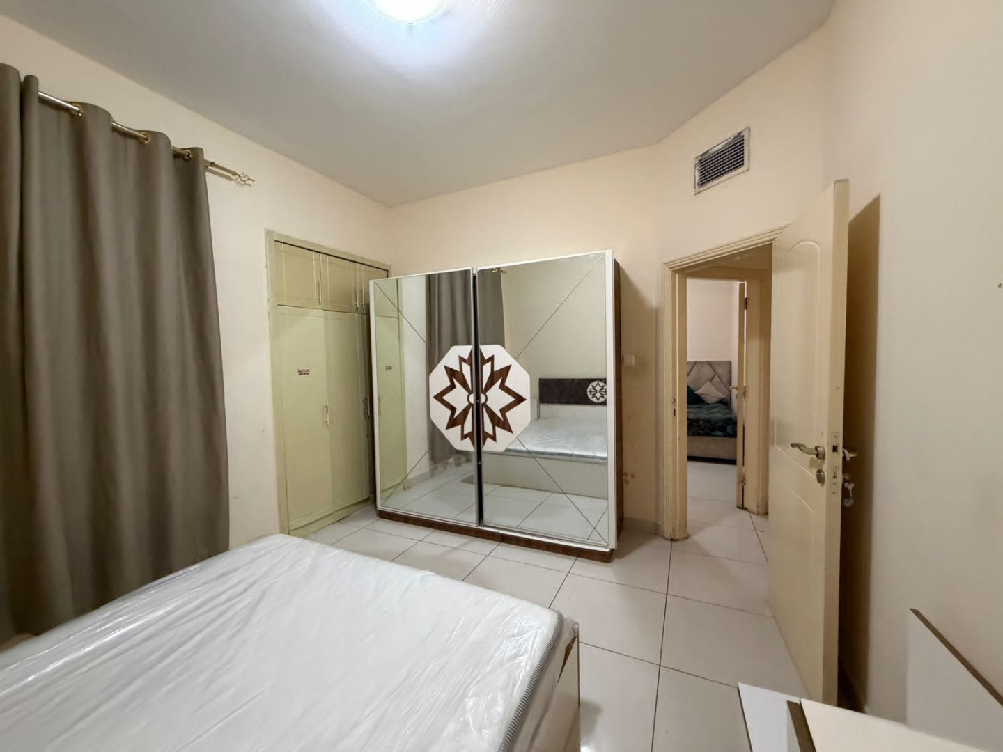 Two bedrooms, a living room, two bathrooms, and a balcony in Al Nuaimiya 1