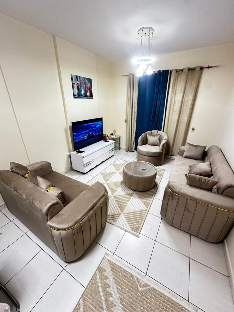 Two bedrooms and a living room, furnished with new furniture