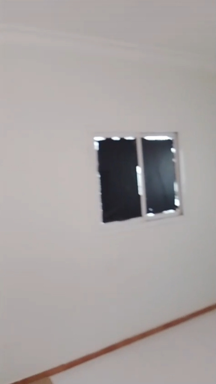 Two rooms, a living room, and a bathroom, including electricity and water.