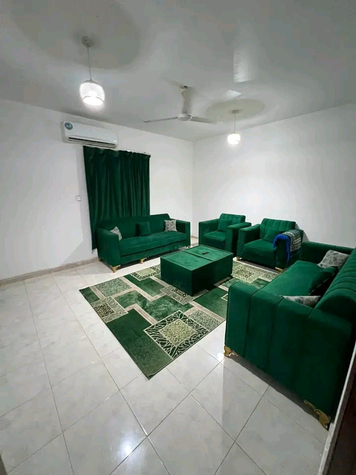 Two bedrooms, a living room, a kitchen, and two bathrooms in Al Ghubra North