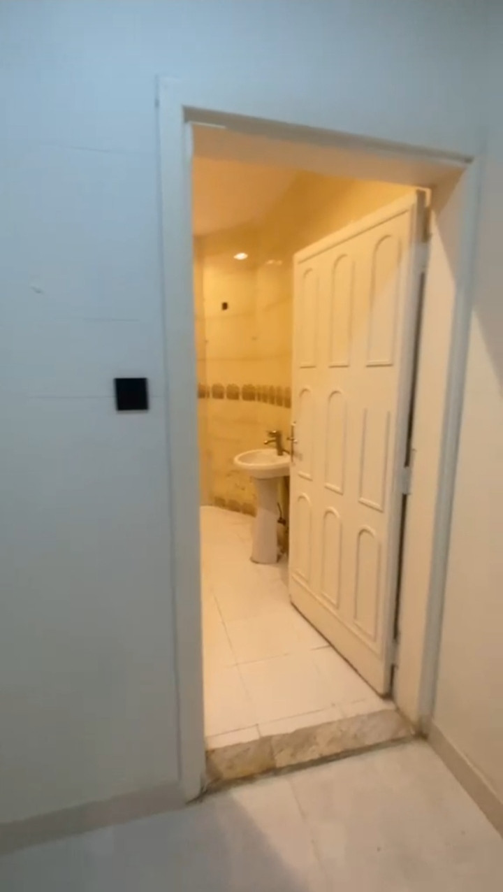 Al Nahda neighborhood, there are two rooms, a bathroom, and a separate kitchen.