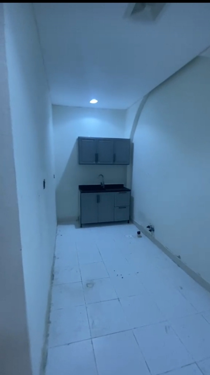 Al Nahda neighborhood, there are two rooms, a bathroom, and a separate kitchen.