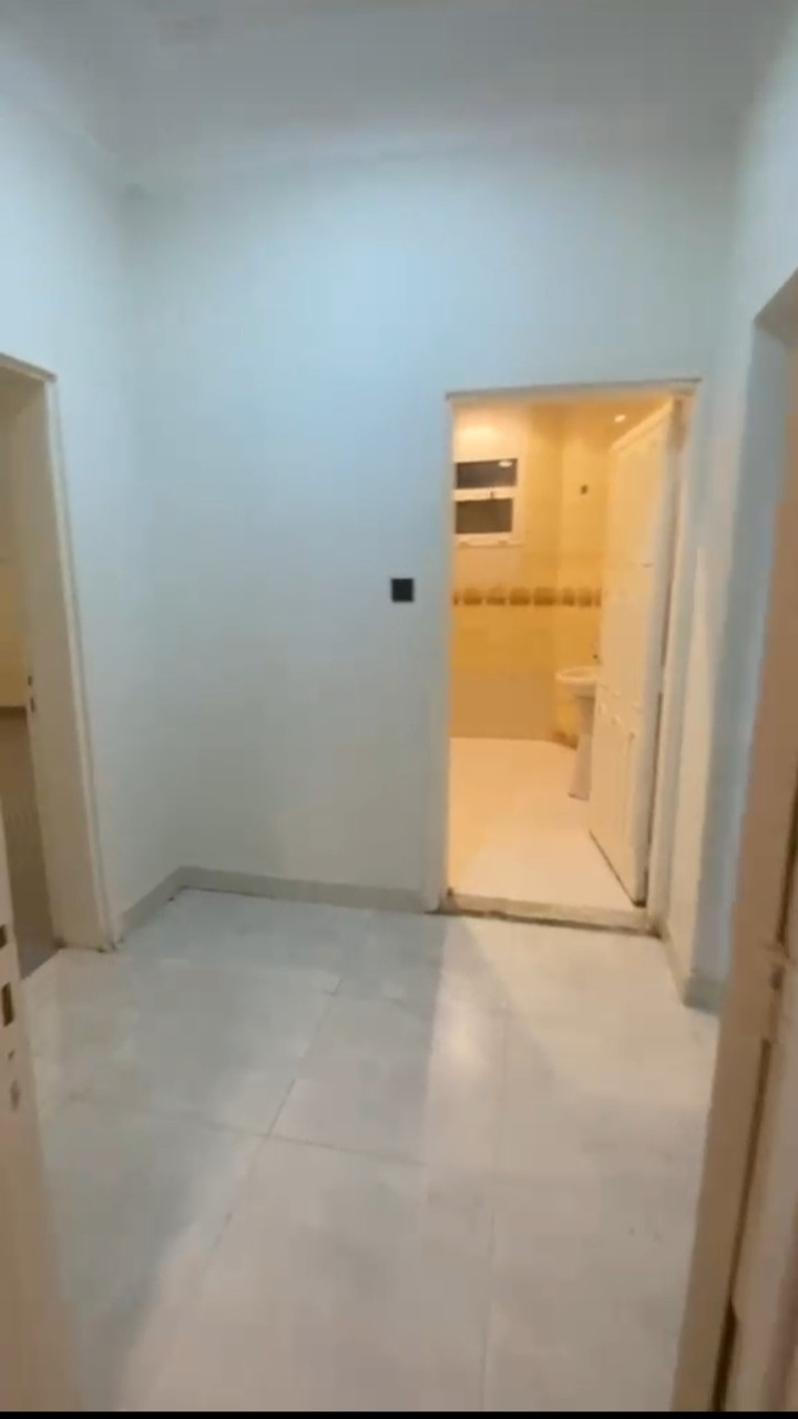 Al Nahda neighborhood, there are two rooms, a bathroom, and a separate kitchen.