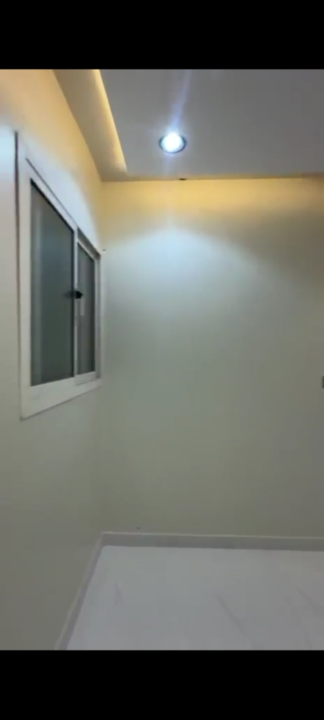 Al Salam neighborhood, two rooms, a living room, and a private yard.