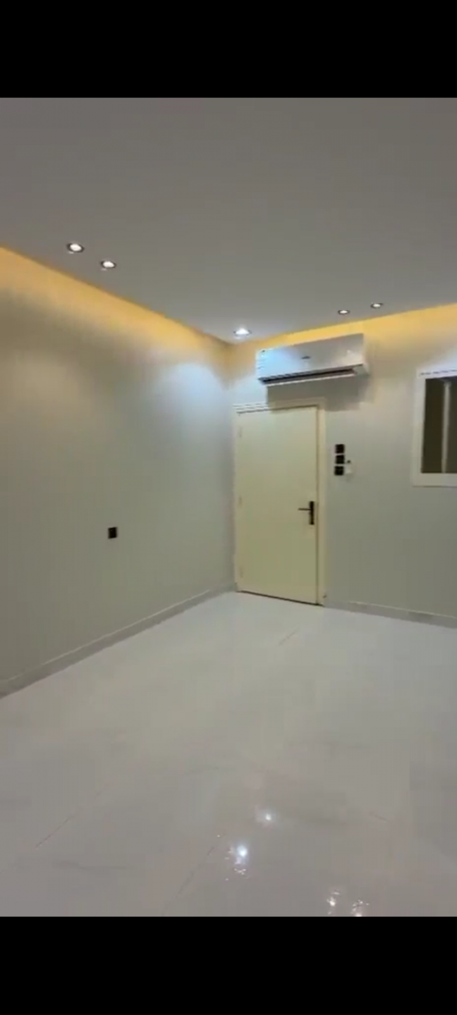 Al Salam neighborhood, two rooms, a living room, and a private yard.