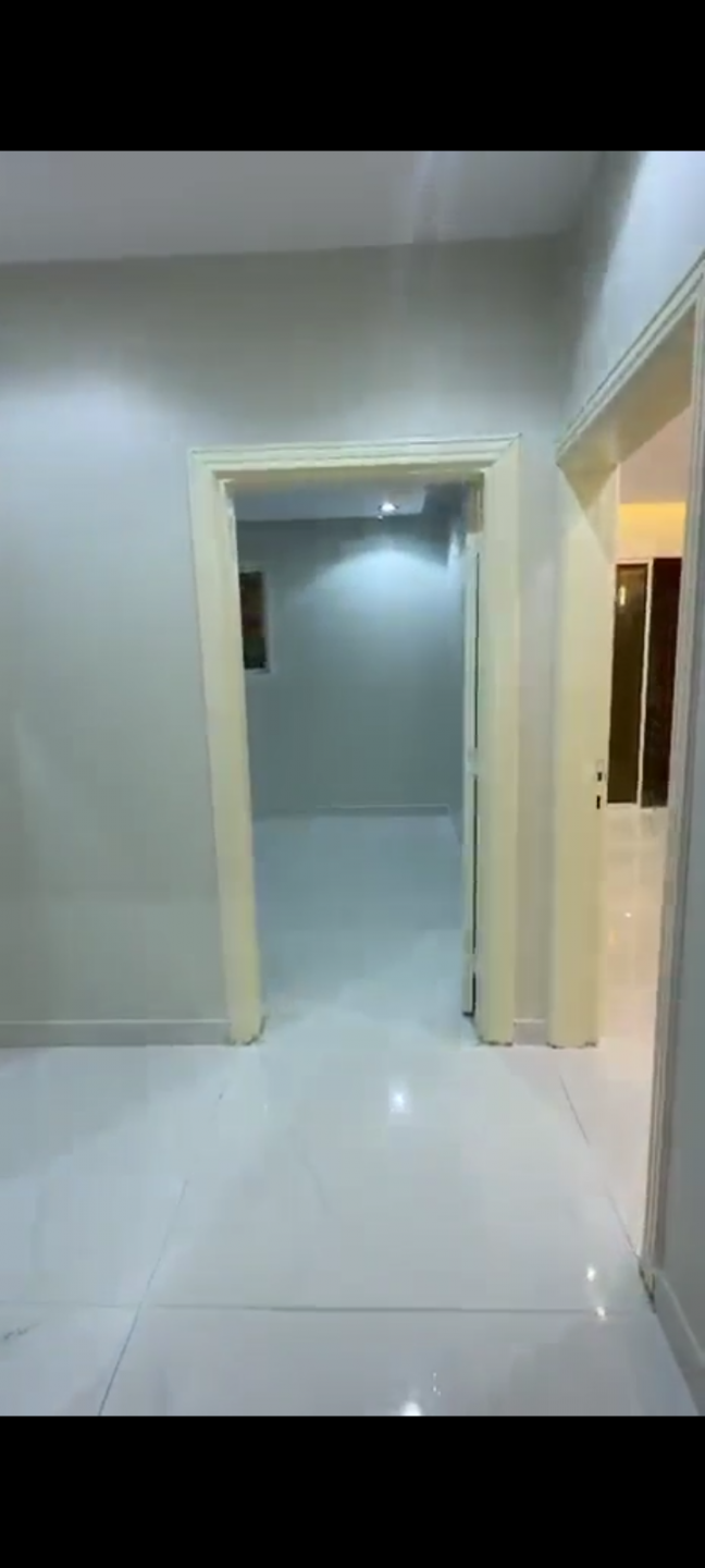 Al Salam neighborhood, two rooms, a living room, and a private yard.
