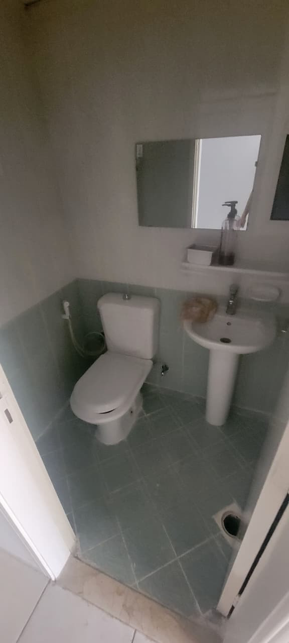 Studio apartment for annual rent in Al Rashidiya, behind Grand Mall, for 20,000 AED payable in 4 or 6 checks.
