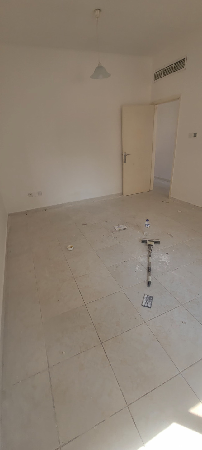One bedroom and living room apartment for annual rent in Al Rashidiya, behind Grand Mall