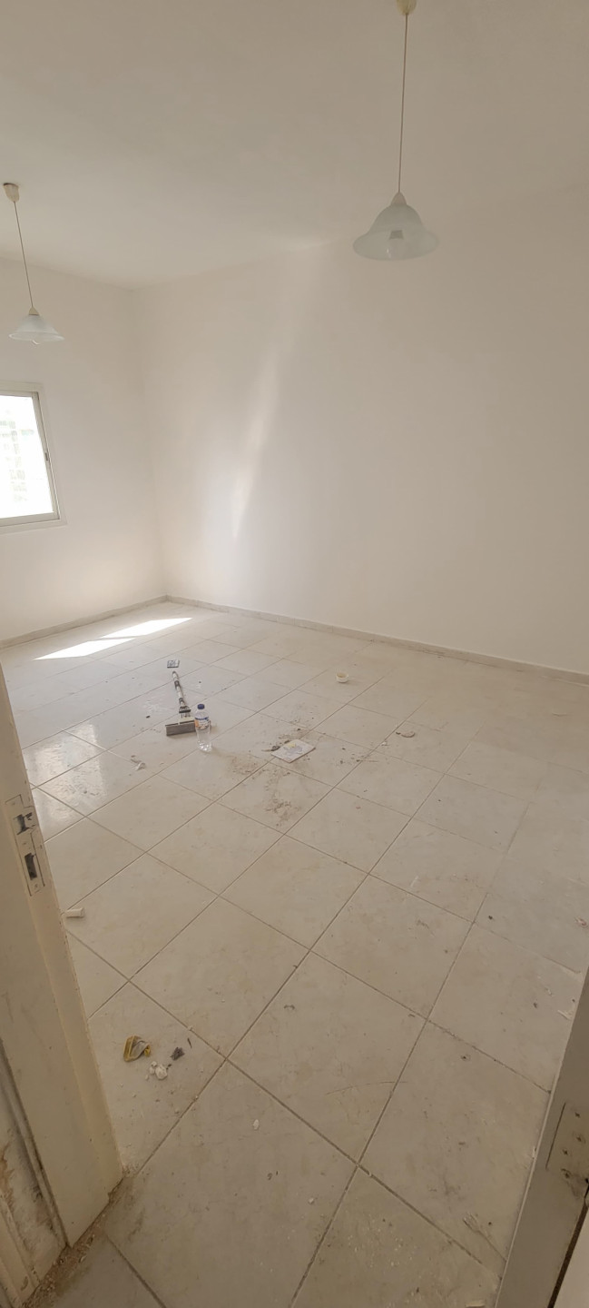 One bedroom and living room apartment for annual rent in Al Rashidiya, behind Grand Mall