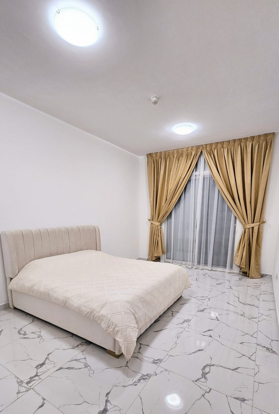 Two-bedroom furnished apartment with a living room for rent in Al Waha Towers