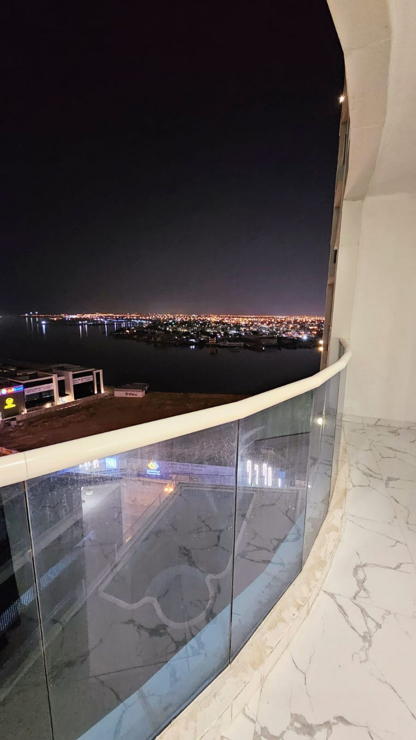 Two-bedroom furnished apartment with a living room for rent in Al Waha Towers