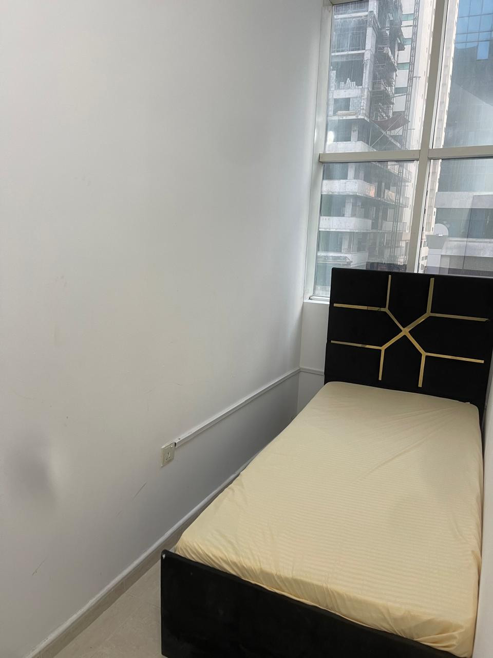 A spacious partition is available containing 2 cabinets/a window