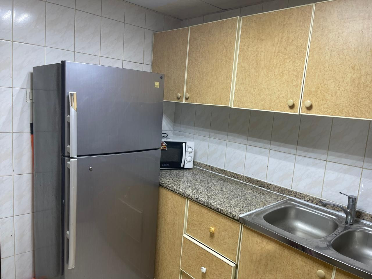 A spacious partition is available containing 2 cabinets/a window