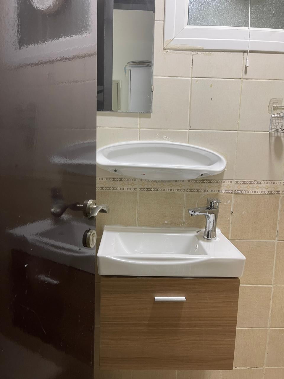 A spacious partition is available containing 2 cabinets/a window