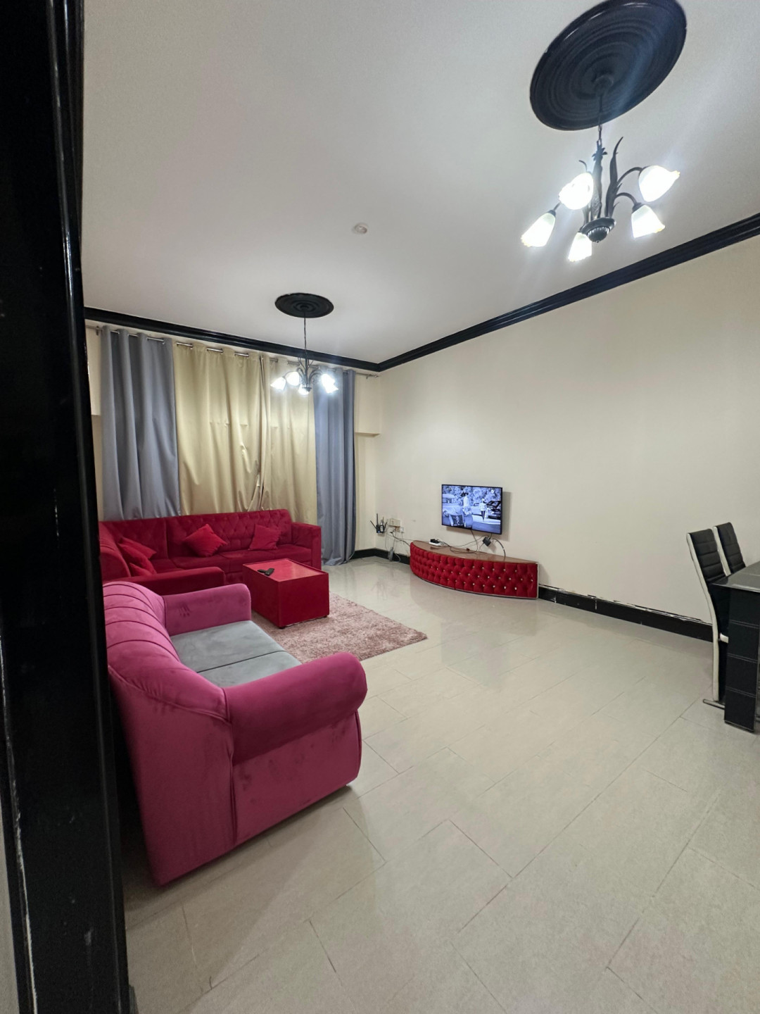 A spacious two-bedroom apartment with a living room is available starting today in Al Taawun.