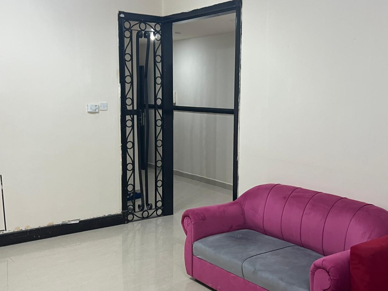 A spacious two-bedroom apartment with a living room is available starting today in Al Taawun.