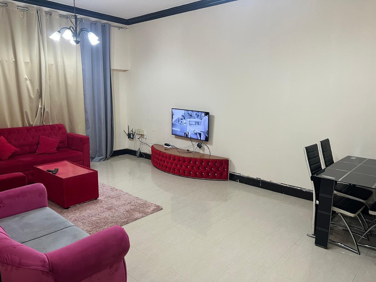 A spacious two-bedroom apartment with a living room is available starting today in Al Taawun.