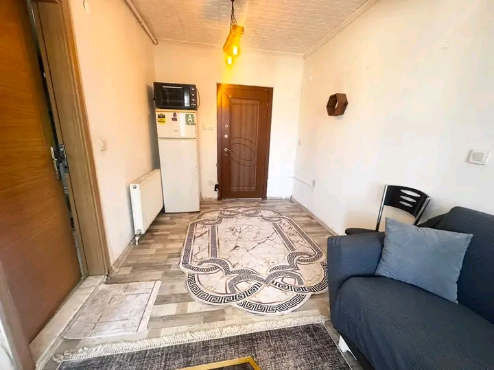 A furnished, air-conditioned 1+1 bedroom apartment is available.