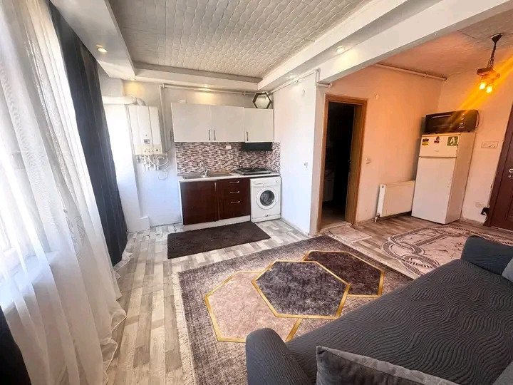 A furnished, air-conditioned 1+1 bedroom apartment is available.