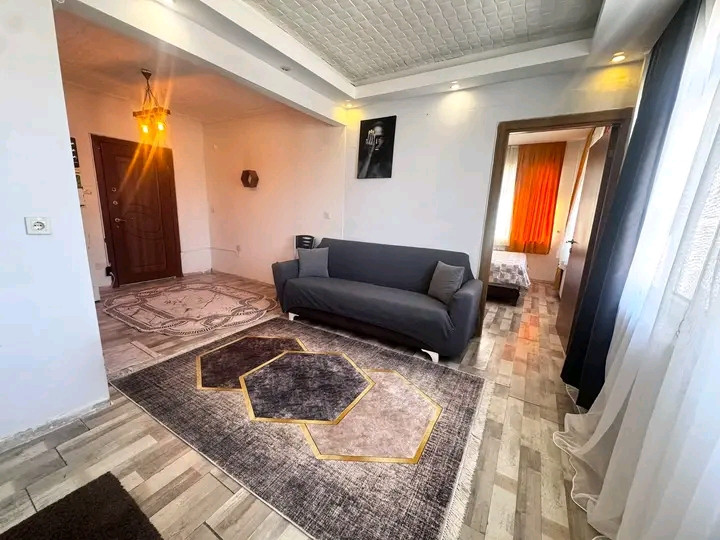 A furnished, air-conditioned 1+1 bedroom apartment is available.