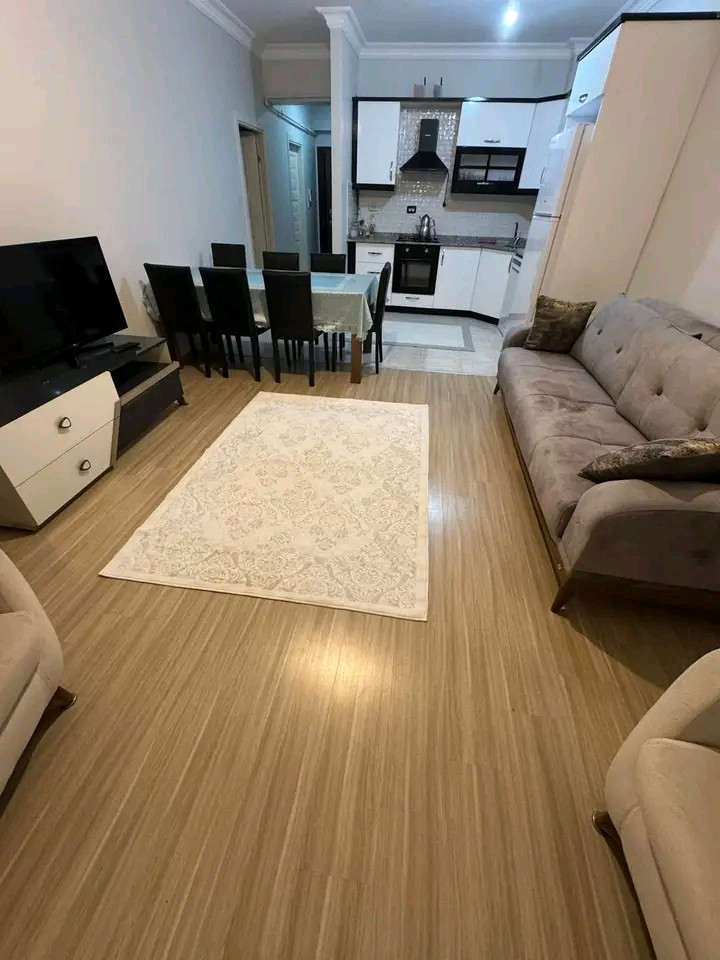A vacant 1.5+1 apartment is available for rent. It features an American-style kitchen, is new, and has two bathrooms.
