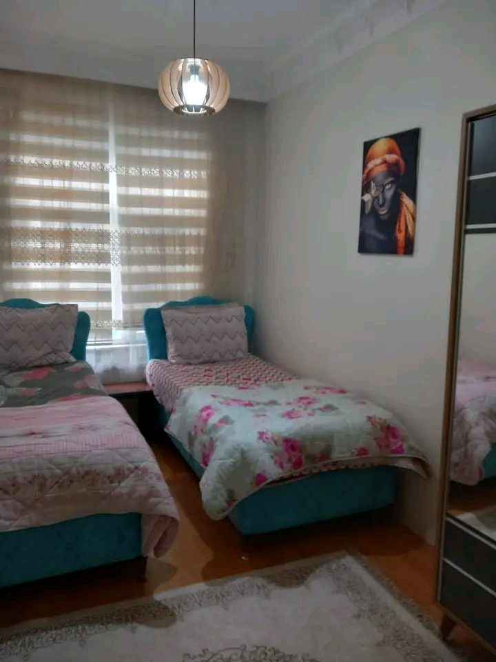 Furnished 3-bedroom apartment with living room, first floor