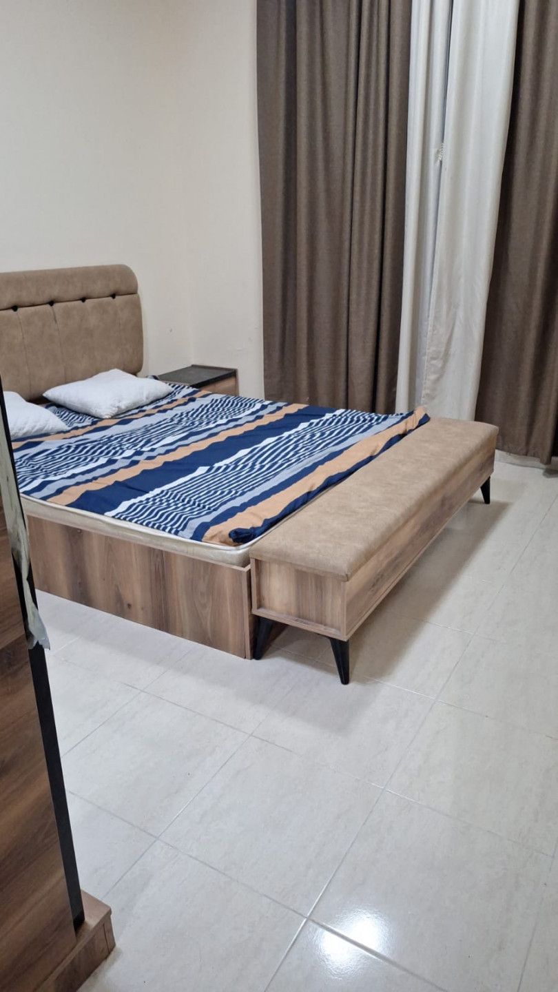 One-bedroom apartment with a living room, clean furnishings