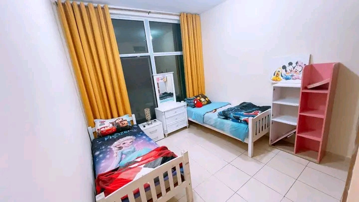Two-bedroom apartment with living room, balcony, and three bathrooms in Ajman