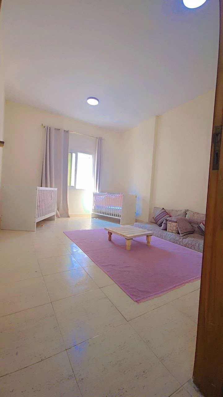 Two-bedroom apartment with a living room, furnished with clean furniture, spacious