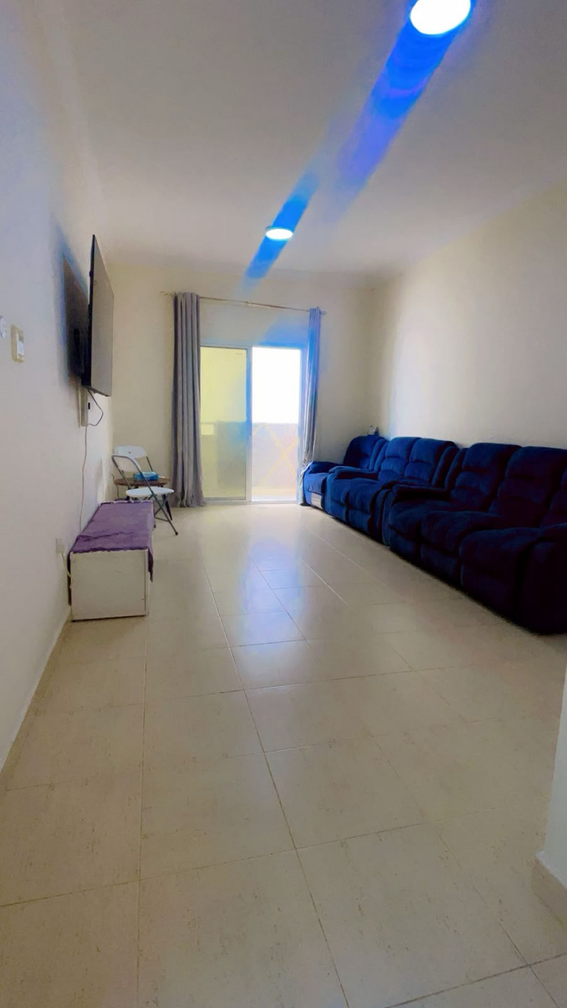 Two-bedroom apartment with a living room, furnished with clean furniture, spacious