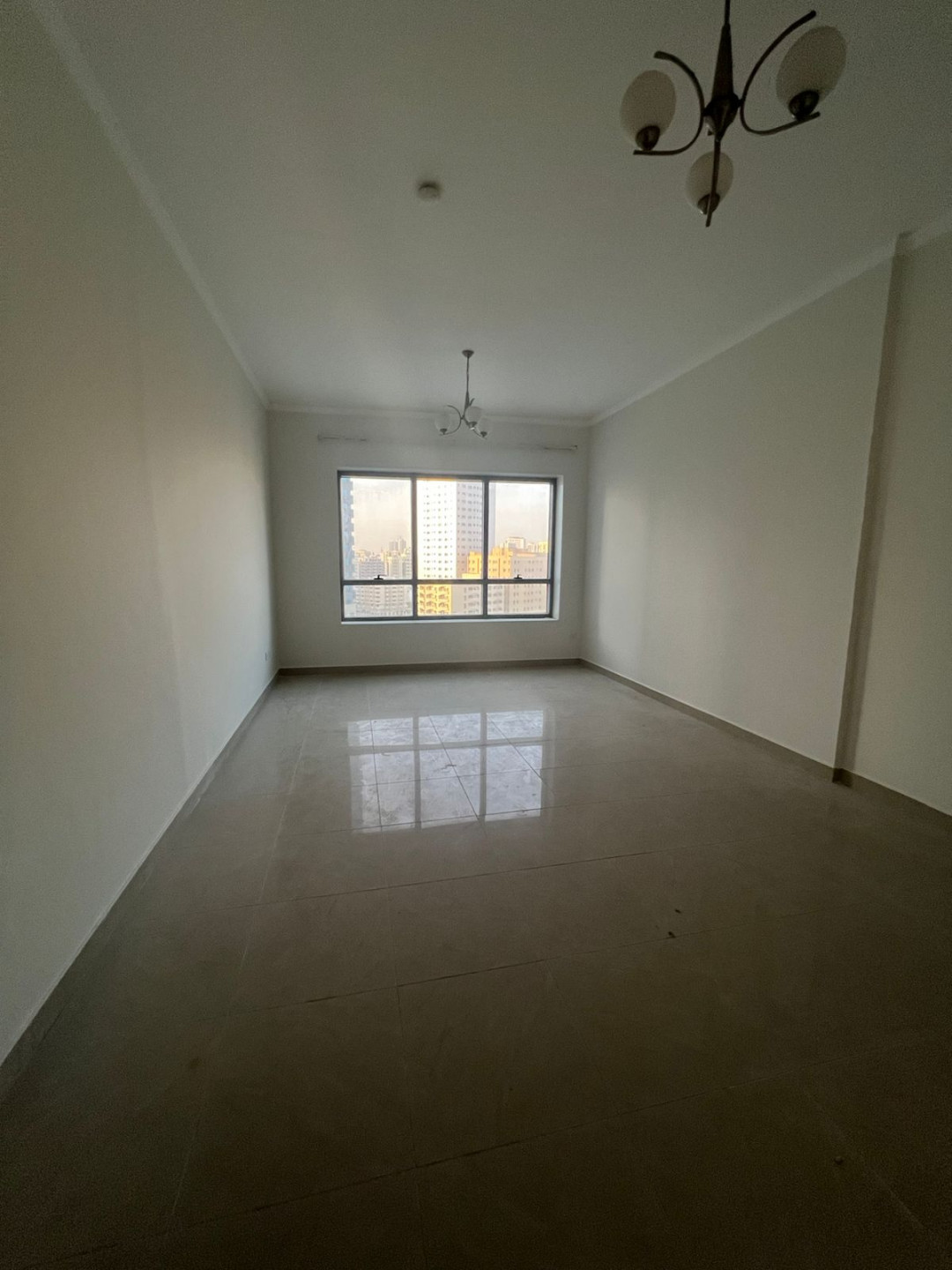 Two-bedroom apartment with a living room and two bathrooms on the Dubai exit, ideal for those working in Dubai, at a very reasonable price... an unmissable opportunity!