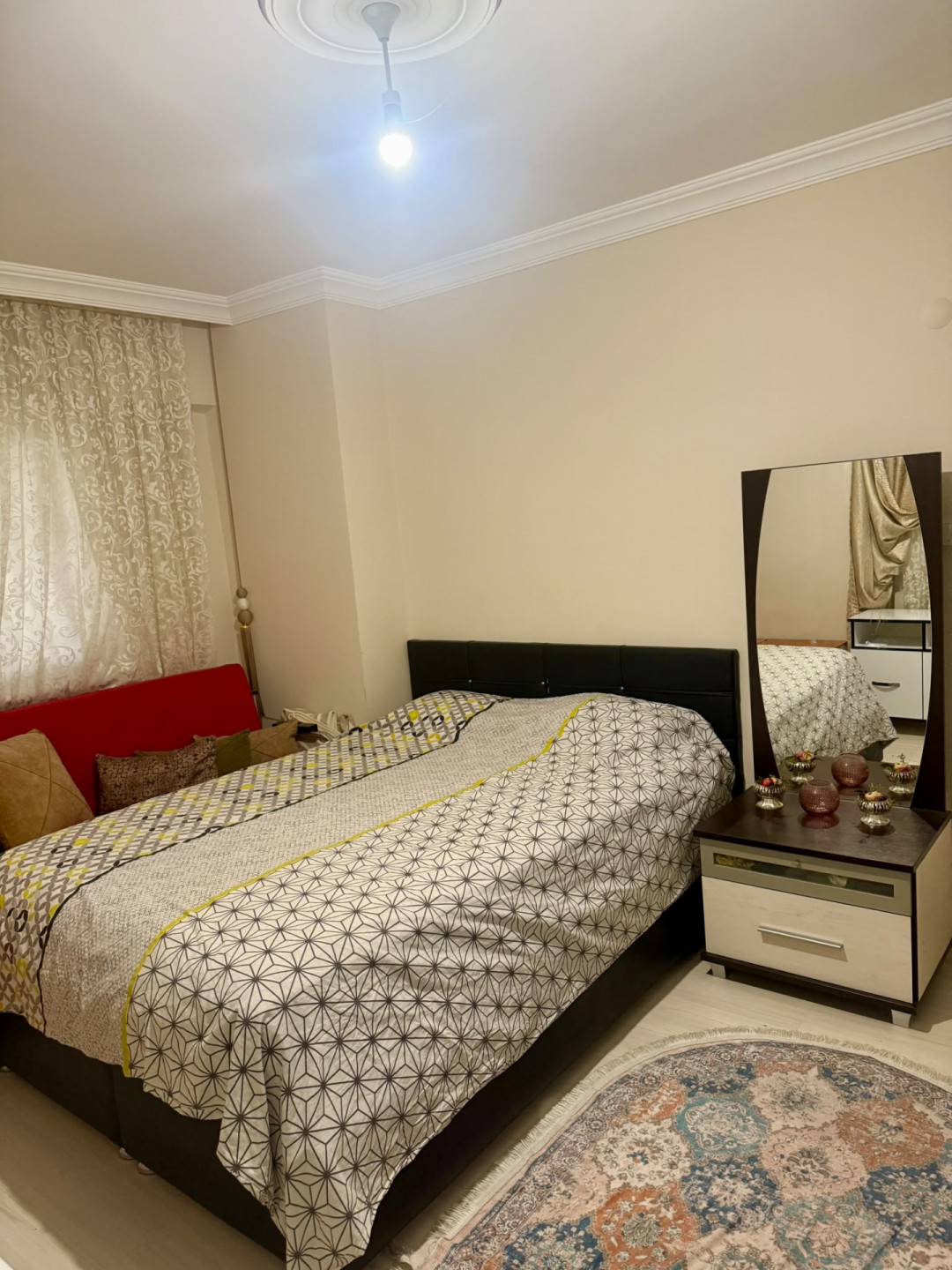 Two-bedroom apartment with a living room, clean furnishings